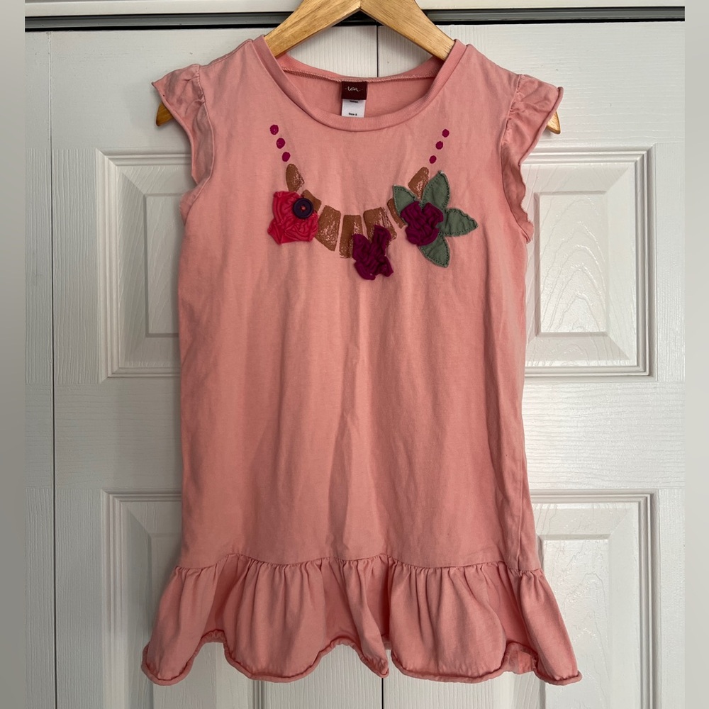 Tea collection floral/button appliqué top